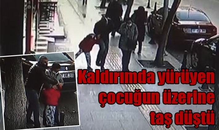  Kaldırımda yürüyen çocuğun üzerine taş düştü